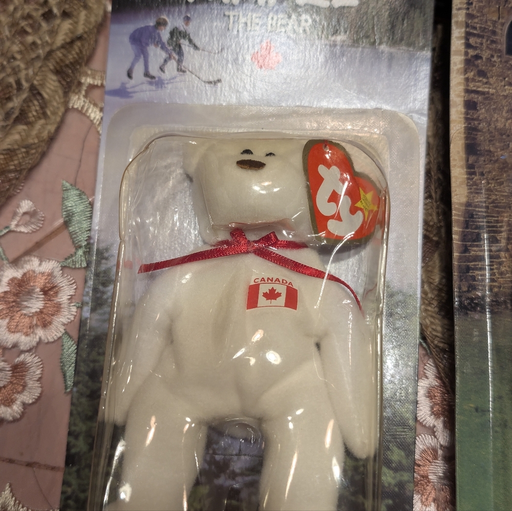 White Beanie Baby Bear with Red Ribbon